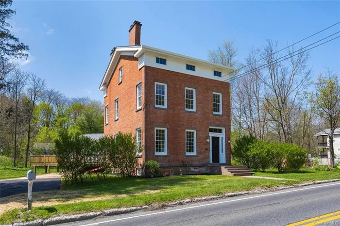 Welcome to The Historical Seneca Howland House, a charming and beautiful brick built 4 bedroom, 3596 sqft unique colonial home. Enter through the front foyer OR the side foyer to be greeted by an open floor plan that allows an easy flow through the main level with 9ft 6 ceiling height in the original part of the home and 8ft in the addition of the home. The first floor features: A large bright completely renovated and remodeled Eat-in-Kitchen with an original brick wall and NEW sliding glass doors with access to a NEW oversized wrap-around deck overlooking the spacious flat garden property. A 1st floor room highlights double french doors and could make a wonderful setting for either a guest room, a library or office/den, plus a full bathroom uniquely split into two rooms. The dining room showcases built in shelving with a side staircase to the upper level of the home. The EXTRA LARGE living room is open to the family room with beautiful modern chandelier lighting. The main foyer highlights floor to ceiling built-in shelving and an antique staircase leading to the 2nd level with a completely renovated bathroom, a choice between two primary bedrooms one with built in closets and shelving plus three skylights for added sunlight. Two additional bedrooms, one would be well suited for a nursery or a home office. Beautiful Crown moldings -5 baseboard moldings - home freshly painted -foam insulation in attic and in basement -NEW recessed lighting -NEW oversized Anderson windows on many select windows -NEW Soffits -NEW gutters -NEW siding -NEW sliding glass door -NEW roof -NEW light fixtures -NEW ceiling fans -NEW renovated bathrooms -NEW kitchen flooring -NEW refinished wide plank oak hardwood flooring -NEW refinished pine pegged hardwood flooring -NEW lighting fixtures -NEW Blacktop driveway -Three chimneys and four fireplaces, not in present use. A fabulous unfinished third floor studio suite has five framed out rooms with electricity just waiting for your own unique finishing touches. The lower level has bilco door access and would make a tremendous wine cellar. The home is walking distance to the quaint town of Pleasant Valley with its local shopping and restaurants plus a short easy commute to the Taconic State Parkway, Metro North Trains, East dale village town square with its trendy boutiques and fabulous dining. Come enjoy what Dutchess County has to offer with its hiking, biking and walking trails along with the beautiful Walkway over the Hudson river