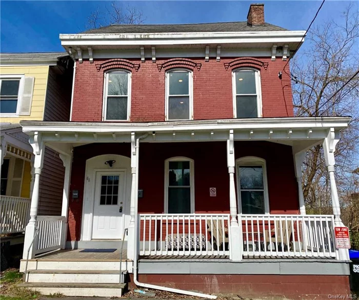 A Bright Sun Drenched Two Story 1st floor apt in a grand picturesque pretty tree lined street! Freshly painted renovation, from elegant entryway through out this gem! Original hardwood floors, stairs and banisters. Beautiful light, bright living room w large windows and glorious original marble fireplace! Spacious bright kitchen, w large pantry and the washer & dryer to use in the basement. 2 bedrooms are close to the full bathroom. Updated with calming fresh colors on the walls and classic moulded ceilings. Enormous back yard and large beautiful front porch for relaxation, come enjoy! Highly efficient combi gas boiler w WiFi thermostat. This sweet gem is close to buses, trains, shops, parks and the famous WALKWAY over the Hudson!!!! Come take a look!