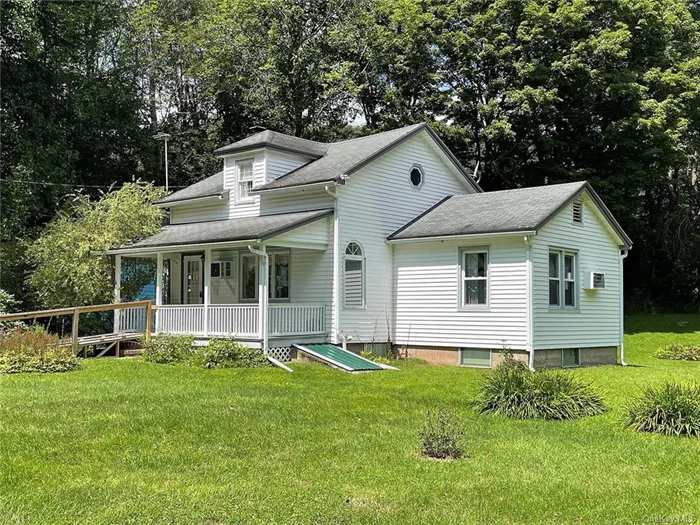 Two houses for the price of one! These two residences sit side by side near the Delaware River in Equinunk, PA. The main house is a 1000-sf cottage with 2 BRs, two baths, living room, kitchen, den, and a deck overlooking a level, private back yard. The second house is a 630-sf former one-room schoolhouse, cute as can be, with an entry foyer, open main room (kitchen, dining, living) and a full bath. Live in one and use the other for guests or rentals. Setting is at the end of a private road. Outbuildings include a lovely screen house, shed, and concrete former sauna that would make a good workshop or studio. These two charming residences are just 15 minutes from the bustling hamlet of Callicoon, NY with its restaurants, shops, supermarket and farmer&rsquo;s market. Two hours NYC. Square footage and taxes are for both houses combined.