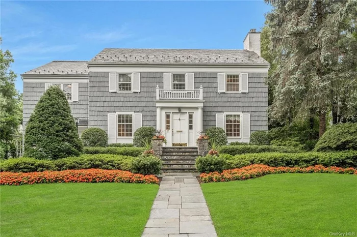 Welcome to this stunning classic Center Hall Colonial in the sought-after Sherbrooke Park neighborhood in Scarsdale. This lovely home in move-in condition offers a combination of warmth & elegance and features a botanical garden of specimen trees & perennial flowers on private level grounds. Large chef&rsquo;s kitchen and a wonderful butler&rsquo;s pantry with built-in wine rack, wine fridge & prep sink that is adjacent to kitchen and formal dining room. Large living room with large fireplace opens to a bright and sunny family room with French doors to stone patio. First floor laundry and large mudroom with garage access is just a step down from the kitchen. Second floor features a beautiful primary suite with a large walk-in California Closet and 2 additional closets. Primary bath with Kohler whirlpool tub, large walk-in shower, double sink and gorgeous, hand painted, tumbled marble medallion on floor. 3-4 additional bedrooms with 2 full bathrooms. Versatile lower level has wood vinyl floors, full bath and ample space for gym or nanny. Move right in!