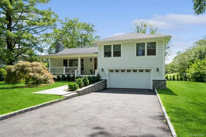 Amazing location in the heart of Rye Brook. This split level home has been thoughtful renovated and updated to modern standards with great attention to detail. Modern, open floorpan with gourmet kitchen, large island with top of the line appliances. Sliding glass doors from the kitchen lead you to the deck for easy entertaining. Lower patio with level expansive yard overlooking elementary school playfields. Generously proportioned primary suite with walk in closet and luxury bathroom. Lower level has additional bedroom and en suite bath perfect for guests or au pair suite. The family room from this level provides easy access to patio from the sliding glass door. Basement allows for extra storage, exercise room or home office area. Property is conveniently located to parkway, schools, shopping, transportation. Not to be missed!