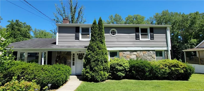 This sunny Crestwood colonial awaits you. With spacious rooms, formal and informal dining areas, hardwood floors, a finished basement, and a one-car garage, this home offers it all. The sizeable Main Bedroom has five closets. Plenty of room to put a Master Bath! The unique layout makes this home perfect for entertaining! The yard is level with Zoysia grass and is nicely landscaped. Ideally located near Central Avenue, and you can walk to Metro-North.