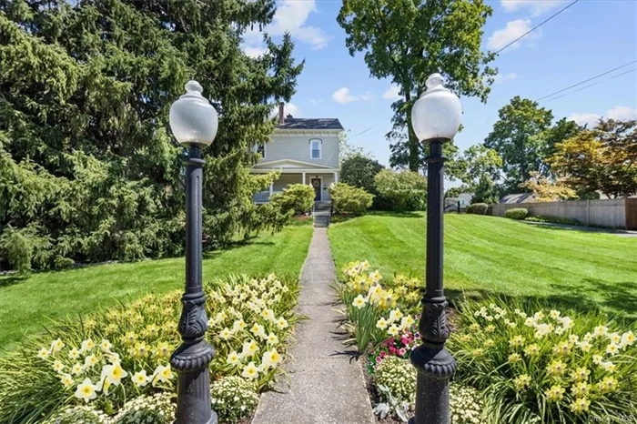 Discover the perfect blend of city living and a country vibe with this charming and unique Historic farmhouse, beautifully renovated and situated on a rare triple lot in Southside Poughkeepsie. Nestled on a quiet, no-thru traffic street, this home is just a short walk from Vassar College, Arlington&rsquo;s vibrant restaurant scene, the local farmers market, Vassar Hospital, and Metro-North trains, offering an ideal mix of accessibility and tranquility. This historical 4-bedroom, 2-bathroom home exudes character, featuring 10-foot ceilings on the first floor and 9-foot ceilings on the second, along with hardwood floors throughout. The spacious front porch leads into a welcoming foyer, opening into a living room adorned with a stained glass window and a cozy fireplace with a wood-burning insert. The full dining room flows into a stylish chef&rsquo;s kitchen, equipped with double ovens, marble countertops, and stainless steel appliances, complemented by a second wood-burning fireplace and a separate pantry. Completing the first floor is a master bath with an oversized marble walk-in shower. Upstairs, the second floor offers four bedrooms and a recently refinished bathroom that features a luxurious clawfoot tub. The semi-finished attic, currently utilized as a workout space and storage area, is waiting for your personal touches to transform it into the flex space of your dreams whether that be a playroom, master suite, or anything else you desire. Step outside to your own private oasis, where a 1, 400 sq ft cedar deck awaits, complete with a swimming pool and built-in cedar planters. The fully fenced backyard includes a newly installed driveway gate and playset, alongside a 2.5-car garage with workbenches and a separate shed. The mature landscaping throughout the property features herb and perennial gardens, adding to the home&rsquo;s tranquil atmosphere. Recent upgrades have enhanced the home&rsquo;s modern convenience, including a new furnace, central air, electrical panel upgrade, sewer liner, and perimeter fencing with a gate. The upstairs bathroom has been renovated with heated floors, while the pool boasts a new filter. Additionally, a new washing machine and dryer have been installed, ensuring this home is ready for its next chapter. Whether you&rsquo;re looking for a full-time residence, a weekend escape, or simply a home that marries historical charm with modern amenities, this unique and charming property offers it all. Don&rsquo;t miss this opportunity to own a piece of history with all the comforts of contemporary living. Taxes do not reflect STAR exemption or Homestead Savings.