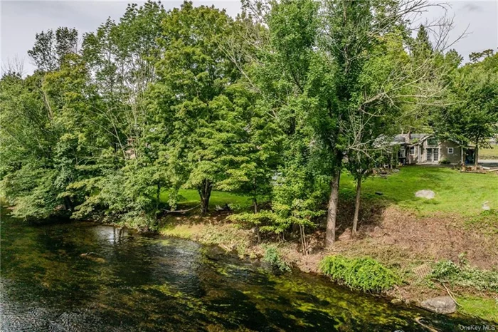 Discover the perfect blend of financial growth and natural beauty with this 3-unit investment property along the scenic Neversink River. Featuring two studio apartments and a one-bedroom unit, this property offers diverse rental income potential and the opportunity to build long-term wealth. Tenants will be drawn to the tranquil riverfront setting, ideal for kayaking or fishing, while enjoying proximity to attractions like the Shawangunk Ridge and the artsy town of Ellenville. Just 90 minutes from NYC, this property combines the best of city convenience and peaceful living an investment in both your future and your lifestyle. This investment property isn&rsquo;t just about owning real estate; it&rsquo;s about securing a legacy, creating opportunities, and enjoying the financial freedom that comes with smart investment decisions. Seize this opportunity to own a property that offers both immediate returns and long-term growth potential. The Neversink River awaits let it be the foundation of your prosperous future.