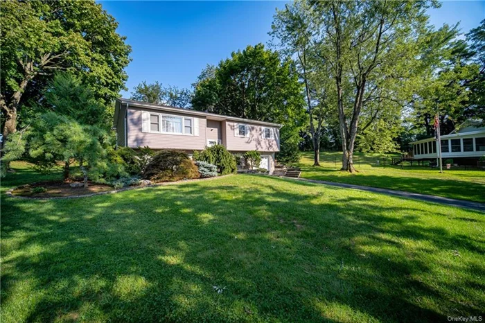 Nanuet! Wow! Be the first to see this extended 4 bedroom, 3 bath low maintenance bi-level set on the end of a double cul-de-sac property. You will love the kitchen which has loads of cabinet space, tiled backsplash, and granite counters, open to the extended family room leading to a large trex deck with 2 sets of stairs. This home has lots of natural light and hi-hats galore. All the bathrooms are new, windows are new, siding is new, Roof is apprx 10yrs, and a young boiler. Many LED fixtures, Driveway apprx 5 yrs, and a beautiful professionally landscaped property with mature trees.