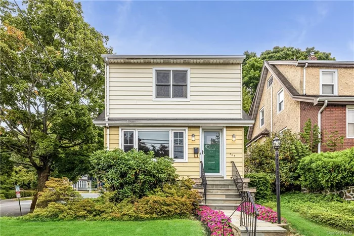 Charming and cute as a button, this delightful Colonial home is nestled on a lovely corner lot, offering the ideal setting for your first home! The open and inviting floor plan boasts a combined formal living and family room perfect for relaxing or entertaining. The dining room seamlessly connects to the kitchen, making hosting friends and family a breeze. You&rsquo;ll love the light-filled kitchen, featuring abundant storage and space. Upstairs, a newly renovated hall bathroom complements a spacious primary bedroom with a walk-in closet, plus two additional cozy bedrooms. The lower level offers fantastic storage, laundry space, and direct access to the garage, adding convenience to everyday living. Step outside to enjoy your private patio, beautifully surrounded by low-maintenance perennial plantings ideal for outdoor gatherings. With a prime location, just a short walk to town, the train, and local amenities, this home is truly a hidden gem. Don&rsquo;t miss out on this must-see charmer!