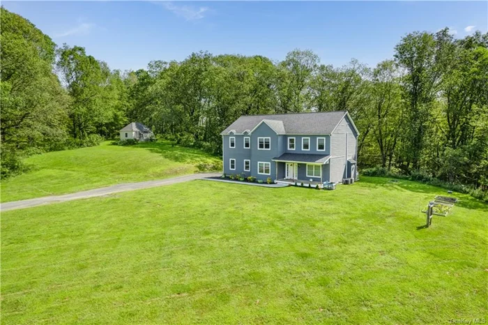 Custom built Colonial, 4 years young in the heart of Rhinebeck! Built in 2020, situated on 1.7 acres in a private cul-de-sac of high end homes, sits this 4 bedroom, 3.5 bath home with tasteful finishes throughout. Luxury vinyl plank flooring, Anderson windows, SS appliances, gas fired range, 42 cabinets and 9&rsquo; ceilings through the first floor with a large and open floor plan boasting of almost 3200 finished SQ FT. Upstairs you will find 3 well sized bedrooms, 2 full baths and an expansive primary en suite with soaker tub, custom tile surround shower and his/hers vanities. Full attic with pull down stairs and high ceilings allows for ample storage space. Full unfinished basement with walk-up, poured concrete walls and roughed in plumbing for future full bath. High efficiency gas fired furnaces, dual-zoned central air and over sized 2 car garage. Exterior features a rocking chair front porch and rear deck, perfect for entertaining! Excellent location, minutes to the Village of Rhinebeck, the Rhinecliff Train Station, schools, all things shopping, restaurants and more! Come see all the Hudson Valley has to offer in the highly sought after Rhinebeck area!