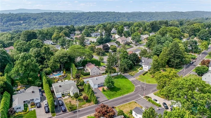 Welcome home to 132 Huntley Drive. Here you will discover the charm and convenience of suburban living. This is a delightful single-story home, beautifully nestled in the heart of Ardsley. This recently renovated ranch offers a seamless blend of comfort and modern flair. The living room, complete with a cozy fireplace, sets the stage for relaxation and homely vibes. An open concept living room to dining room features sliding glass doors that invites sunshine to spill across the floor, opening out to a serene backyard. The kitchen is chic and functional, striking the perfect balance between aesthetic appeal and practicality. The home features three well-appointed bedrooms and full shared bathroom. As for location, the home is located on a corner lot and in a prime spot. Enjoy close proximity to schools, shops and transportation is a breeze with nearby train and major highways, essential for the daily commuters. Ideal for anyone looking for a home that blends suburban tranquility with the conveniences of modern living, this house is ready for you to unpack your bags! Amenities include: hardwood floors; central air chef kitchen; level fenced yard; primary bedroom; expansion possibilities. Ardsley Schools. Must See!