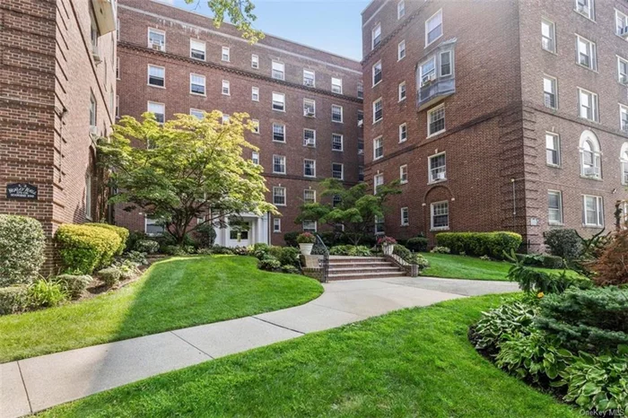 Amazing opportunity to own a large sun drenched corner unit in Henley Hall with beautiful garden views. This beautiful and well maintained Pre-War building is located in the prestigious Jamaica Estates and is a pet friendly building with a private dog run, elevator, laundry room, doorman, and live in super!  This fully renovated apartment has incredible high ceilings, hardwood floors, large closets with ample storage, eat in kitchen, dining room, large living room, bathroom with separate shower and whirlpool bathtub, and large bedroom with his and her closets.  Close to public transportation (including F train) and shopping. Maintenance includes water, heat, and taxes.  Pets allowed. Requirements: Minimum 20% down payment, debt to income ratio not to exceed 30%, and credit score of 700+