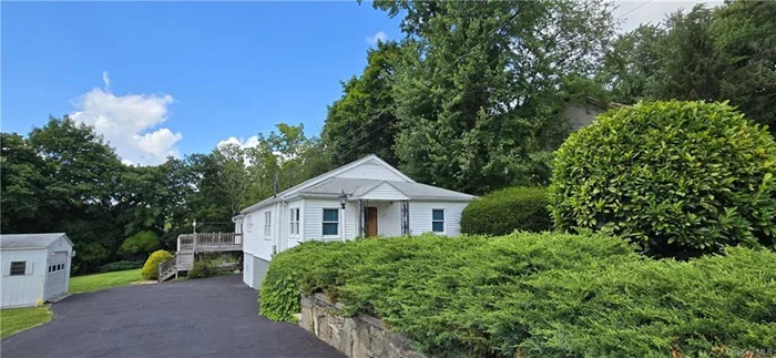 Charming Ranch-Style Home with Endless Potential! Welcome to this adorable ranch-style home, filled with possibilities and ready for you to make it your own. With thoughtful features and ample space, this property is perfect for those looking to create a cozy and personalized living environment. 3 Potential Bedrooms: All bedrooms are on one level, providing plenty of storage space. Currently carpeted, these rooms have hardwood floors waiting to be uncovered and restored to their original beauty. The kitchen retains its original charm and functionality, now with the addition of a dishwasher for added convenience. Laundry is located just off the kitchen, making household chores a breeze. The full bathroom has been updated years ago, offering modern comfort and style. Enjoy the convenience of both a living room and an additional 15X15 family room located at the rear of the home, perfect for relaxation or entertaining. The home features a small garage underneath, ideal for storage of a small car. Workshop, plus a spacious 12x20 shed for additional storage or hobby space. The home is equipped with oil heat, while the family room is heated by propane for efficient and cozy warmth. A large deck off the family room provides additional outdoor space to enjoy. Gutters are fitted with heat tape to prevent ice buildup, and the back room features a newer roof compared to the main part of the home.