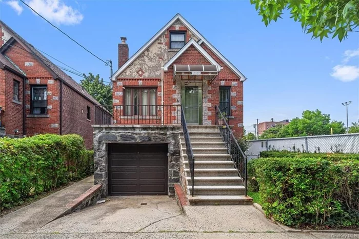 Well maintained and spacious 2 family brick detached home located in upper Morris Park. Walk to Calvary, Einstein and Jacobi hospitals as well as public transportation, shops and restaurants on Morris Park Avenue and Williamsbridge Road. First time on the market in 56 years. The main dwelling unit features a spacious 3 (possibly 4) bedroom duplex. Upon entry you have a dining room, kitchen with breakfast bar, spacious living room, full bathroom, king size primary bedroom, queen sized 2nd bedroom plus full staircase to the finished attic with 3rd bedroom and potential for a 4th bedroom/flex space. There is private laundry in this unit. The walk-in unit is a large 2 bedroom and 1 full bathroom with private entries. The primary bedroom is king sized, and the 2nd bedroom is queen sized. Features of this lovely home include detached on 32 x 100 lot, sun filled, high ceilings, hardwood floors, a beautiful fenced-in manicured yard, large front porch, driveway and one car garage. This home is move-in-ready