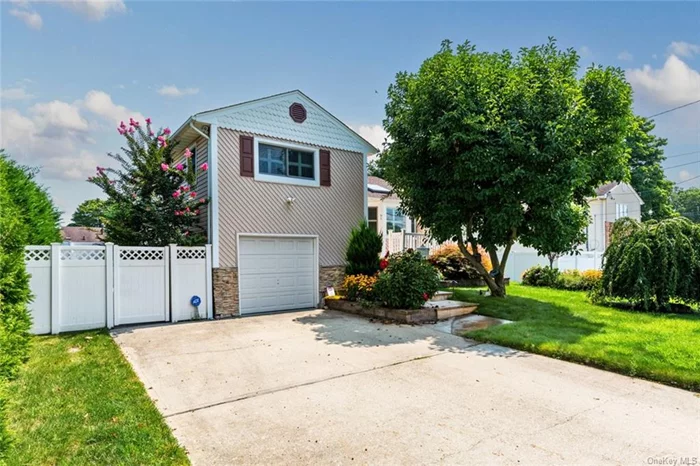 Welcome to 91 West 16th Street, in the heart of Deer Park. This split-level 3, bedroom, two-full-bathroom home is beautifully renovated and ready for its next homeowner! When you first enter, you will notice the high ceilings with tons of natural sunlight, gleaming dark-stained hardwood floors, and custom built-ins, setting a perfect tone! The kitchen features stainless appliances, granite countertops, and a dining room pass-through! Upstairs are three bedrooms, one of which was converted into a massive custom closet (and can be made back into a bedroom) and a full bathroom. Downstairs, a separate outside entrance to the ground level has a summer kitchen, a full bathroom, and additional living space. Outside, the backyard is private, with a deck and above-ground pool! This is an opportunity to take advantage of!