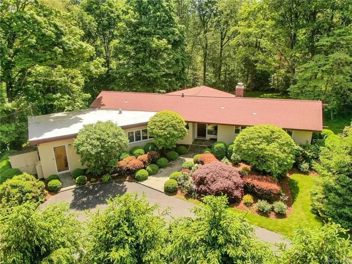 Modern lifestyle living in desirable Armonk, NY. This Mid-Century Modern gem, set on a lush 3.6-acre site includes two tax lots and extends 500 feet adjacent to Town Conservation Land. Featuring 3 bedrooms and 2 full baths on a single level with an open concept plan. This home offers ample privacy, vaulted knotty pine ceilings, exposed beams and expansive windows, seamlessly bringing the warmth and character of nature indoors. The updated kitchen is a chef&rsquo;s dream with a Subzero refrigerator, 6-burner Viking gas range and a Viking double Oven with convection baking. Living room with FPL and dining room are open and perfect for entertaining. Home office with private entrance. Terrific outdoor garden and large patio for your outdoor living. Additional features include central AC and a 16KW generator. Conveniently located near schools, shopping and more. Modern meets stylish living!! Don&rsquo;t miss this opportunity!