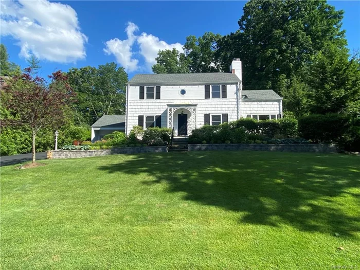 This bright and modern Center Hall Colonial is a true gem, nestled on 1/3 acre with a fully fenced yard, making it the perfect place to call home! Situated in the heart of Fox Meadow, this residence offers both convenience and charm. The first floor is thoughtfully designed with an open entryway leading to a spacious Family Room, a Formal Living Room with a cozy gas fireplace, a convenient Powder Room, and a versatile Office/Library/Sunroom/Bonus Room featuring charming built-ins and direct access to the patio. The Gourmet Eat-In Kitchen is a standout, showcasing a new Quartzite Natural Stone Waterfall Center Island and countertops, ample cabinet space, stainless steel appliances, a wine fridge, and pantry closets. The kitchen seamlessly flows into a sun-drenched Formal Dining Room with sliding glass doors to the patio, perfect for summer BBQs and entertaining. Upstairs, the second floor boasts two Primary En Suites, each with walk-in closets, a full hall bath, two additional bedrooms, and a Walk-up Attic/Bonus Space. The Walk-out Lower Level provides additional flexibility as a gym, hangout space, or playroom, complete with Laundry and a full bath. This home combines modern amenities with a functional layout, creating a welcoming environment perfect for comfortable living and entertaining.