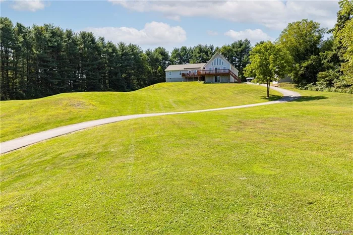 Discover the epitome of serene living in this custom-built 3-bedroom, 3-bathroom home, perched atop a hill on 5.5 acres in the picturesque town of Staatsburg. Built in 2014, this modern retreat boasts panoramic mountain views, offering a private, tranquil setting that feels worlds away yet is less than 15 minutes from Rhinebeck and just 20 minutes from Millbrook. The open-concept design features soaring cathedral ceilings, flooding the space with natural light and accentuating the stunning views from every room. With two home offices, this property is ideal for remote work or creative pursuits. The chef&rsquo;s kitchen flows seamlessly into the dining and living areas, perfect for entertaining or relaxing. Step outside to your own private oasis, complete with a heated, inground saltwater pool ideal for summer days spent lounging poolside. The oversized, detached 2-car garage offers ample storage, and the option to purchase an adjacent 5.6-acre lot provides even more room to expand or ensure total privacy. Conveniently accessible via the Taconic State Parkway or Amtrak, this location is a commuter&rsquo;s dream while maintaining the peaceful charm of the Hudson Valley. Don&rsquo;t miss the opportunity to own this hilltop haven, where modern luxury meets natural beauty.