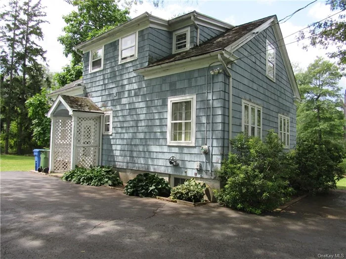 Restorer&rsquo;s Delight! Charming c. 1923 Goshen village oldie with original character and detail preserved! Set on lovely 1/2 acre grounds on favored village street! Large LR with fireplace opens to DR with beamed ceilings and French doors to deck! Breakfast nook! BR and full bath on 1st floor! 2 large BRs, small office and full bath on 2nd floor. Large pantry! HW floors throughout! Built in china cabinet! Selling As Is!