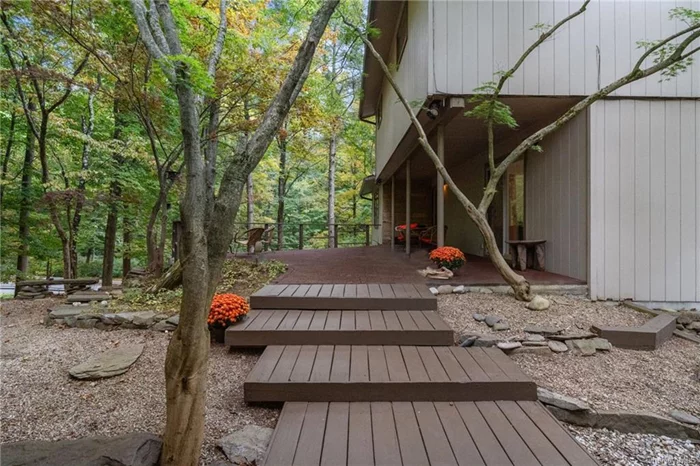 This Mid-Century modern home is a true gem. It retains the true soul of a classic 60&rsquo; home in all the best ways. Built on an enormous rock outcropping and perched amongst the trees, it allows one to seamlessly embrace the environment while experiencing nature&rsquo;s beauty. A Zen paradise greets you upon entry, with a brick patio and Japanese maples leading to your entry. Once inside one is amazed by the purity of line, light, form, and function, as it was intended to be. Vaulted wood ceilings, floor-to-ceiling windows offering mountain and seasonal river views, original wood floors, and updated retro bathrooms complete the picture. All rooms are spacious and light-filled, and embody all that we cherish in a mid-century modern home. The vibe is cool, sophisticated, and fun. This paradise feels like a private tree-top retreat, yet close to all the Hudson Valley&rsquo;s destination hot spots.