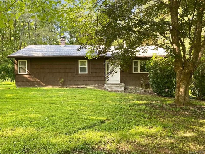 Located on a quiet county road less than 3 miles from the historic Village of Rhinebeck, this 4 bedroom, 2 bath Ranch is nested on one acre level lot. Suitated in the middle of the lot, the frontal lawn offers privacy as the rear yard has sufficient room for entertainment considerations. The refreshed interior is move in ready. Livingroom, dining area with sliders to a good sized three season room and three bedrooms and a bath are on the main level. The finished lower level with garage access and walk out to the rear yard also has an additional bedroom and bath. Conveniently located with easy access to lifestyle amenities; this property is easy to view, call to schedule