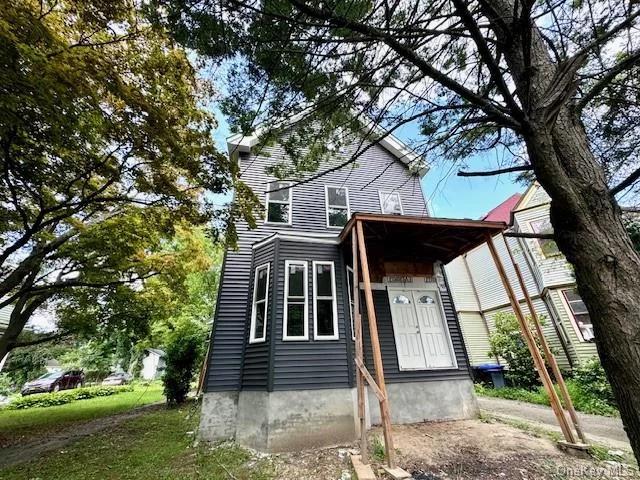 This 1, 800 sq. ft. Victorian home in Poughkeepsie, New York, boasts a chance for change. The exterior has been meticulously updated with a brand-new roof, fresh siding, and energy-efficient windows, preserving its classic appeal while ensuring durability. Inside, the home has been fully gutted to the studs, offering a blank canvas for custom renovations. The spacious layout features high ceilings and some original architectural details that promise to add character once the interior is redesigned. With its solid foundation of modern upgrades and historic potential, this Victorian home presents a unique opportunity for a visionary buyer to create a bespoke living space that honors its heritage while meeting contemporary needs. This is a Fannie Mae Homepath Property. This is a First Look Property no investor offers until 09/25/2024 at 4pm