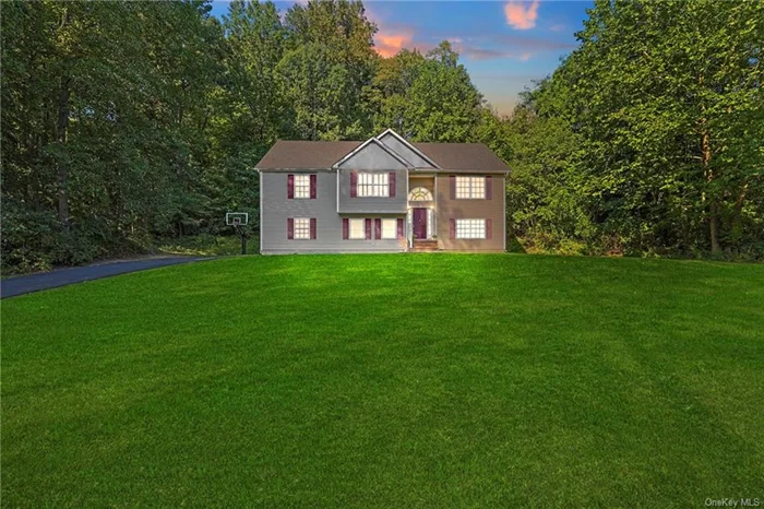 In Milton, this 4-bedroom, 3-bath 2, 424 sqft Raised Ranch built in 2012 with 2 car attached garage on 1.80 acres has so much to offer.Located between Poughkeepsie and New Paltz, & close to the Hudson River, Walkway Over the Hudson, 9W, Rail Trail, Mid-Hudson Bridge, and Metro-North Train, this home offers unparalleled convenience. As you enter upstairs, you are greeted with a huge open floor plan with cathedral ceilings. It consists of an elegant Eat in kitchen with tons of cherry cabinets, stainless steel appliances, and large island. Right next to it is a formal dining area with sliders that go out to a balcony deck. After your meal, you can retire to your living room with fireplace. Head down the hall to two big bedrooms, hallway full bath and big master bedroom suite with walk-in closet, hardwood floors, tray ceilings and master bath ensuite with shower and separate jacuzzi tub. Central air conditioning throughout the house. Make your way downstairs, huge family room with walkout And fourth big bedroom, which could be used as a first floor bedroom. adjacent to the stairs is the utilities, additional storage, laundry room, and two car attached garage. Enjoy the local wineries, excellent restaurants, Pick Your Own farms, farmers&rsquo; markets, recreational parks, trails, and more. This property is the perfect blend of comfort, style, and functionality, set in a beautiful and convenient location.