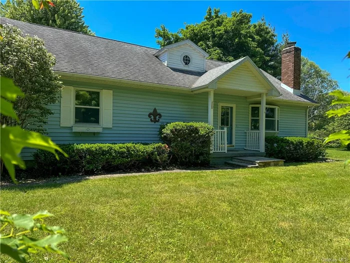 The perfect story book style 4-bedroom 3.5 Bath home awaits you. Complete with distant view of the beautiful Catskill Mountains and so much charm. This home has been loved and maintained to with attention to detail and updated in all the right places. Enter into the spacious Living Room with gleaming maple floors, handsome stone fireplace with driftwood mantle. A country style Kitchen is abundant with plentiful workspace and hosts a breakfast bar for extra dining or doing homework after school. Sliding glass doors from the Dining Room, leads out to the back Deck for relaxing and dining al fresco with retractable awning for those hot summer days. A lovely, enclosed Porch invites you into the massive Family Room where all can enjoy Movie or Game Night. A convenient Laundry with a partial Bath on first floor along with The Primary Bedroom with its own Bath and double closet. The second Bedroom is ready for guests and has an oversized closet. On the upper level up a wide staircase with large landing for an office space or sitting area there are two additional generous Bedrooms with lovely Parquet floors throughout and another Bath. A full Basement has room for future growth, plenty of storage and updated utilities. Home features a whole house standby generator giving extra comfort on those stormy days. New house water filter system and whole house dehumidifier. Sitting pretty on Two Park Like acres with fabulous curb appeal and abundant with mature plantings and shade trees which gives a sense of privacy. A two car Attached Garage and a Baby Barn has room for all your outdoor accessories. Located off one of the nicest roads in Red Hook within 5 minutes of the village, schools, Rec Park and all the wonderful attractions Hudson Valley offers.