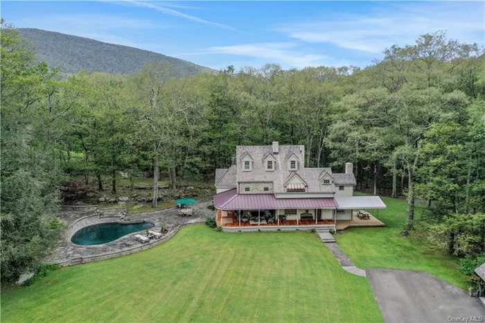 Available for the first time in 50-plus years, this iconic Hudson Valley home boasts extraordinary character and charm in the perfect setting -- a secluded 10-acre nook of ponds and woods just minutes from the Ashokan Reservoir. The house, a masterful blend of timeless farmhouse style, craftsmanship and luxury, is the polar opposite of cookie cutter, with classic window awnings, cedar shakes and locally quarried bluestone steps setting the gracious tone from the moment you pull up a long driveway and arrive at the wrap-around front porch. Inside, a cozy paneled keeping room with a pegged beam ceiling opens to a large and sunny living room and gourmet kitchen, bracketed on one side by an authentic working Rumford fireplace, and on the other by a dining room with a double-height wall of French doors and windows leading to a terraced bluestone patio and pool. Visually, the space opens up, from cozy to dramatic, in thoughtfully calibrated stages that call to mind a distinguished farm house being expanded and improved over many charmed decades of life. The ground floor also includes another beamed den with a double-height ceiling and woodstove, plus a full bathroom and laundry. A stunning open staircase, with a beautiful cherrywood banister milled on site, rises 3 stories to the 4 bedrooms and 2 more full bathrooms upstairs, including a massive primary suite with an oversized bathroom with soaking tub. The other bedrooms, featuring pegged beam framing and dormer windows, are particularly charming. For overflow guests, there&rsquo;s also a separate 2-level guest house with bathroom, overlooking a spring-fed pond, with another larger pond sited just across the winding driveway. Located on one of the quietest and most sought-after roads in the Hudson Valley, the property feels wonderfully secluded, despite being minutes by bicycle from the reservoir and its popular hiking trails, 15 minutes by car from Woodstock and 2 hours from NYC. ACCEPTED OFFER AS OF 10.9.24