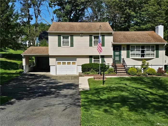 Discover this delightful three-bedroom split-level home nestled on a peaceful street. With its attractive curb appeal, it&rsquo;s perfect for first-time buyers or those seeking a downsized lifestyle. Step inside to find hardwood floors throughout and abundant natural light. This mid-century home offers easy maintenance and a serene outdoor space, with a three-season room, deck and side patio. Stay cozy on chilly days by the fireplace, which features a gas insert (convertible to wood-burning). Enjoy modern conveniences like a central vacuum, whole-house fan, attic sensor fan, and UV water treatment. The home&rsquo;s prime location offers easy commuting with proximity to Route 55, Taconic State Parkway, shopping, schools, the rail trail, and gyms. Recent updates: Mitsubishi split system installed in 2024, Water softener added in 2023, new gutters installed in 2021.Septic tank being pumped Sept 2024, Don&rsquo;t miss out! Call today to schedule a viewing.