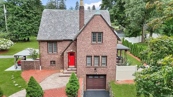 Discover timeless elegance in this all-brick Colonial/Tudor home, featuring a classic slate roof and durable brick siding. This 3-bedroom, 2.5 bath beauty offers a stunning cherry wood kitchen with granite countertops and stainless appliances, a finished basement perfect for extra living space, and a convenient one-car garage. Situated on a desirable corner lot, the property boasts a built-in pool and fenced yard, providing a private retreat for relaxation and entertaining. A rare blend of historic charm and modern amenities this home has it all! Discover timeless elegance in this all-brick Colonial/Tudor home, featuring a durable slate roof and classic brick siding. This 3-bedroom, 2.5-bath beauty offers a stunning cherry wood kitchen with granite countertops, a finished basement perfect for extra living space, and a convenient one-car garage. Situated on a desirable corner lot, the property boasts a built-in pool and fenced yard, providing a private retreat for relaxation and entertaining. A rare blend of historic charm and modern amenities this home has it all!