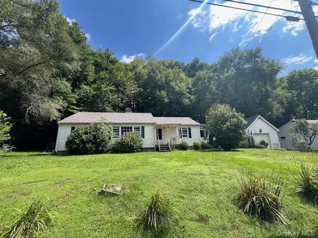 Great opportunity for home ownership at a reasonable price! Close to Port Jervis for commuter trains, buses, farmers markets, conveniences, hiking trails and so much more. Charming 1950&rsquo;s home features wood floors throughout, previously updated kitchen, dining room, charming living room with beautiful tongue and groove walls and brick fireplace, 3 bedrooms, bath and full basement. Enclosed breezeway attaches to a large one car garage with upstairs storage. Large side yard and back deck add to the outdoor space to enjoy. Bonuses are New Well, New Septic, Newer roof! With some fresh paint and TLC this great home will be your sweet Sparrowbush home!