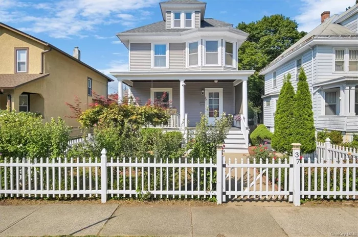 Welcome to 37 S. Grand Ave, a beautifully preserved 1911 Colonial on the desirable south side of Poughkeepsie. Just a half mile from Vassar and 2.5 miles from the train station, this well-maintained 3-bedroom, 1.5-bath home exudes charm and convenience. Light-filled rooms and original details, including hardwood floors, trim, and stained glass windows, add character. Original millwork in the front entry offers a warm welcome and French doors with glass doorknobs lead to spacious living and dining rooms. The kitchen boasts brand-new, high- quality stainless appliances and granite countertops and is just off the cozy mudroom offering convenient access to the detached 2-car garage. Ductless mini-split systems provide cooling. Upstairs, the primary bedroom has a private balcony overlooking the backyard, while the finished attic provides space for an office, playroom, or extra bedroom. The large front porch, beautiful gardens and white picket fence make this a place you&rsquo;ll be proud to call home.