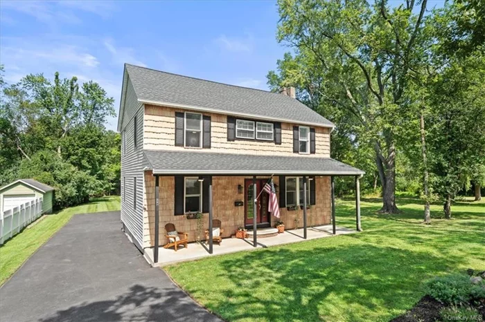 WOW! Beautiful, bright, spacious and METICULOUSLY renovated. This wonderful home features a gorgeous custom renovation recently gutted with so many upgrades to mention. Featuring a new HVAC system and driveway in 2024. New roof, new septic leech field, new filtration system and more in 2017. This home has gorgeous, durable wide-plank floors, Pella double-hung wood-framed windows, updated kitchen with butcherblock countertops and a modern, welcoming, classy feel you will love! Perfectly set back from the road, relax on the covered, rocking chair front porch with ceiling fans and beautiful lighting. Other features include electric fireplace and village amenities. The spacious and level yard is lined with tall trees providing privacy, yet so conveniently located in the Village. Walking distance to restaurants, library, schools and more! Heritage Trail is biking distance from the house. So much to enjoy and love in Goshen, the county seat and home of the Hamiltonian!