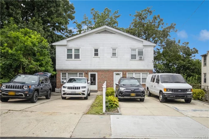 Two-Family Home Nestled in the highly sought-after Lincoln Park neighborhood, this two-family five story semi-detached duplex home offers an ideal living arrangement for both homeowners and investors. Unit 1 features a spacious main level with a living room and eat in kitchen adorned with hardwood floors, and powder room, while the second level boasts 3 bedrooms and 1 bath. Perfect for those seeking comfort and convenience. The lower level unit, with a private entrance, features a cozy 1-bedroom, 1-bath setup, also a basement for storage. Additionally, the property includes driveway parking for up to four cars, ensuring ample space for residents and guests alike. Commuters will appreciate the prime location, with easy access to buses, major parkways, and a quick 25-minute train ride to NYC.