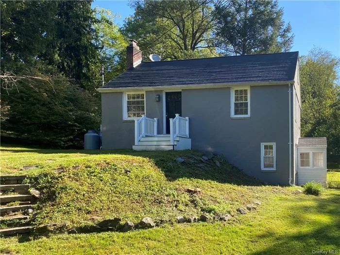 1940&rsquo;S Cottage Style Home on the edge of the village with .82 acres of open lawn area and mature trees. The lower level features a kitchen, dining room with a beamed ceiling, a cozy office, powder room and a laundry/utility room. The second floor is highlighted by a living room with wide board floors and a fireplace with an antique carved mantel, two bedrooms and a bathroom with a glass-enclosed shower. The walk-up attic level has been partially insulated, sheet rocked and electric. The property includes a garden shed/barn and a one-car garage. The fenced backyard, lawn area offers nice privacy. this home is convenient to dining, shopping, and just minutes from Amtrak, offering a balance of country charm and village convenience.