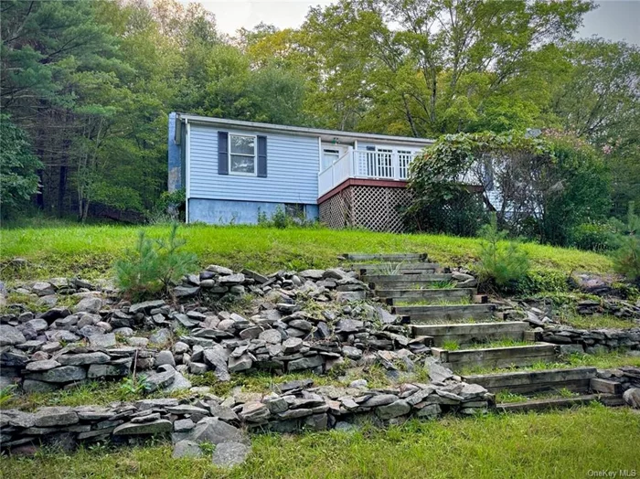 Private and spacious single-family ranch with large deck and backyard, attached garage, and abundant storage space. Conveniently located just off U.S. Route 209, this rental home is an easy commute to Middletown and only minutes away from Port Jervis and shopping in Matamoras. On a quiet, wooded lot, the house is connected to nature through a large backyard and expansive deck with fire pit for roasting marshmallows. Ample natural light with big windows throughout the house, it features a master bedroom, two additional bedrooms, and two full bathrooms, a large, bright living room, and open kitchen. Attached garage below helps protect you from the elements, and basement offers plenty of storage space. One-year lease. No pets. Non-smoking.