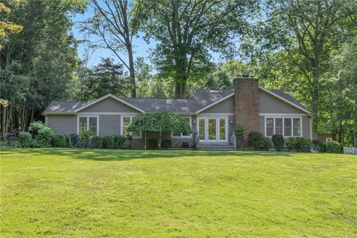 Nothing looks or feels better than fresh paint & new carpeting. With freshly painted interior, new carpeting, & refurbished hardwood floors as seen, this 3 bdrm 2.5 bath home is perfectly sited on 1.3 acres, the rear of the home has a beautiful sun dappled deck. The home has an open floor plan for gracious living. EIK w/ stainless steel GE Profile & LG appliances opens to dining room space & large great rm w/ vaulted ceilings, skylights, & 2 sets of sliding glass doors that open to the deck. Spacious living rm w/ FP & ensuite primary bdrm complete 1st level. 2nd level provides 2 bedrms & full bath w/ skylight. The property has whole-house automatic generator and an electric car charge portal in garage. Pets will be considered.