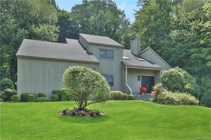 Warm & bright, 4-Bed/3.1-Bath open-concept contemporary set on 1.45 landscaped acres w/natural gas utilities, municipal sewer & water plus Chappaqua schools. A skylit double-door entry welcomes you. The front-to-back living room w/vaulted ceiling & hardwood floor is a delight for entertaining guests. Host a holiday feast in the front-facing formal dining room w/recessed lighting & hardwood floor, all served up from the gourmet open modern kitchen w/Viking gas range w/convection oven & matching hood, Sub-Zero refrigerator/freezer, Bosch dishwasher & granite-topped center island w/built-in microwave oven. The kitchen is open to the breakfast area for casual dining. A wide rear deck w/awning sits right off the kitchen/breakfast area for easy alfresco dining. Relax in the adjoining family room w/built-in, fireplace, slider to deck & hardwood floor. Upstairs private quarters include a primary suite w/walk-in closet & ensuite bath, and three additional comfortably-sized bedrooms (two w/built-ins) all w/hardwood flooring beneath carpeting. The spacious unfinished basement has approx. 850sqft of potential including the laundry room & full bath w/shower. Solidly constructed w/steel beam joists. New roof 2019. Very pretty landscaping adorns the property all around. Commandingly & privately set in a sought-after neighborhood close to school, shops & town.