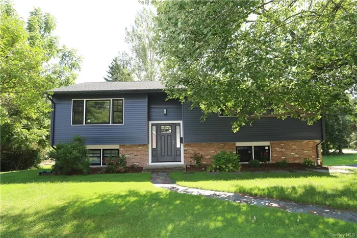 A stylish, full gut-renovation has recently been completed on this 3-bedroom, 3-bathroom Rhinebeck Village home. The entrance has stairs that lead to the open living and dining area, the kitchen with new stainless-steel appliances, granite countertops and a full tile backsplash, and 3 bedrooms- including the ensuite primary bedroom, and 2nd full bathroom. Downstairs is a finished lower level with sliding doors to the backyard, a third full bathroom, laundry area, and interior access to the attached 2-car garage.  Located on a quiet corner in Rhinebeck Village, the property also includes a garden shed, landscaping, and both driveway and street parking on .37 acres. Landlord pays lawn mowing and snow removal. Tenant responsible for utilities. First month + 1 month security + 1/2 month commission due at lease singing.