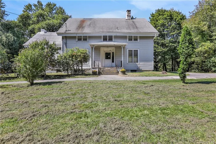 This large solid 2 story home with a legal accessory apartment is waiting for someone to love it. Bring your imagination and with some new updates throughout this home will be amazing. This home sits on 4.26 acres and also a small lot of .06 is included in this sale, Town of Fishkill and Beacon School District. The living room is large with carpet and 8 foot ceilings, the eat in kitchen is large to have large gathering, gas stove is 2 years old, double stainless steel sink, vinyl flooring, ceiling fan with light, pantry and back door to the yard. Full bath has been renovated in January 2024. The first floor has 2 rooms you can use either as a den, office, playroom or guest room, both rooms are large with high ceilings, off the one room is a porch for storage and also has the washer/dryer connection for laundry. Off the kitchen is the door to the legal accessory apartment, this unit is great for guests.  The accessory apartment has a nice size living room, eat in kitchen and upstairs are 2 bedrooms, and a full bath, private entrance on the side of house. Upstairs on the main house is 4 nice size bedrooms and a full bath with double sinks and a shower stall, also a attic space with ladder access for good storage. This home has several nice size closets throughout. The basement is large with a cement flooring and this is great space for storage of seasonal items, luggage, seasonal clothes bins. This home has Geothermal heating and cooling that was installed in 2017. The septic tank was replaced in 2019, this is also City of Beacon water. This home offers a nice size carport for storage of equipment or one car. This property is tranquil and you can enjoy a fall evening near the firepit. Large driveway offers lots of parking for many gatherings. Show this house today before it gone tomorrow.