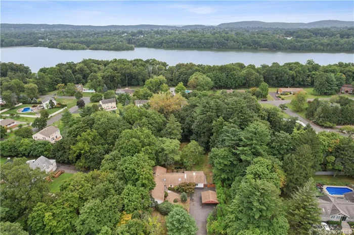 Welcome to 147 Strawtown Rd, a stunning property located in the heart of New City, NY, the county seat of Rockland. This spacious 5-bedroom, 3.5-bathroom home sits on a perfectly level acre of land and is within the award-winning Clarkstown School District, with Clarkstown South High School. You&rsquo;ll enjoy easy access to the tranquil beauty of nearby Lake Deforest, and a quick commute to NYC or Westchester. The home boasts 2736 square feet of living space, including a wheelchair-accessible 1-bedroom accessory apartment, perfect for guests or extended family. The master suite offers a luxurious jacuzzi tub, while the large kitchen features granite countertops, stainless steel appliances, and a charming country farmhouse sink. The bright and airy layout is enhanced by oversized windows, slider glass doors, and skylights, filling the space with natural light. Enjoy the peace and privacy of this quiet lot, complete with central air conditioning and an oversized carport. This is your chance to own a slice of Rockland County paradise. It will auto-confirm. Taxes are being grieved and are expected to be reduced to approximately $17, 514 ($16, 518 reflecting basic STAR)