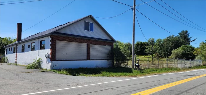 Attention developers! This 1.61 property located in the busy area of Monticello in the Hwy commercial zoning, which gives residential and commercial ventures opportunities and many users with the municipal water and sewer. The property totally fenced, level and the corner of two roads with solid block building with a high ceilings and dry full basement with propane furnace. The structure is currently undergoing a remodeling including new electrical systems, a new roof, new sheetrock with the plans of large residential home office or commercial for daycare, storage units automotive parking lots, food distribution and more. This building&rsquo;s flexibility and renovation offer ample room for customization to suit your specific needs. Its convenient location near Route 17 and Monticello&rsquo;s growing community makes it an excellent investment opportunity. Nearby attractions include Resorts World Casino, Kartrite Indoor Water Park, and YO1 Spa, ensuring a steady flow of traffic and potential customers.