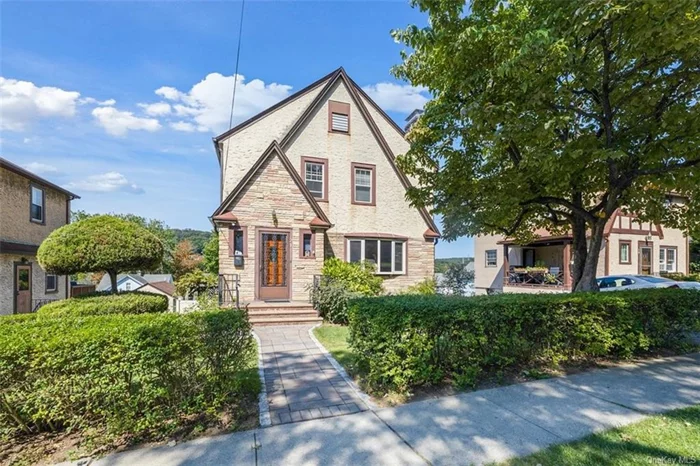 Welcome home to this charming Tudor, a true testament to pride of ownership, lovingly maintained & updated by the same family for over 50 years! Gracious entry foyer opens into the sun drenched living room with cozy fireplace. The formal dining room, large enough to host all your family gatherings flows into the kitchen showcasing quartz counters, stainless steel appliances & center island. Updated powder room completes this level. Upstairs you&rsquo;ll find the primary bedroom, two additional bedrooms, and beautifully updated hall bathroom. Gleaming hardwood floors through-out add to the homes character & appeal. The walk-out lower level provides a versatile rec/play room and ample storage. The patio is enhanced with trellis and a level yard for all your outdoor entertaining. Detached 1-car garage provides additional storage. Conveniently located close to schools and shops. Not to be missed!