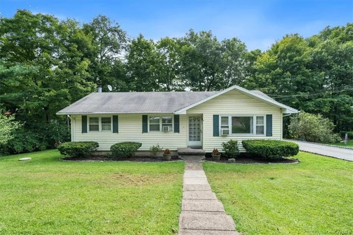 PRIVACY abounds in this cute as a button ranch situated at the end of the street and framed by woods on three sides. Step inside to gleaming hardwood floors and a nice sized living room highlighted by a picture window. An adjacent dining room flows into a large country kitchen with access to the driveway for easy unpacking of groceries! Three bedrooms and an oversized full bath are located down the hall for easy one level living. The BONUS is a huge three season room with vaulted ceiling surrounded by nature. Watch the seasons turn as you relax in this cozy room! A full finished basement with wood burning stove is perfect for extended family living. Call today for a private showing!