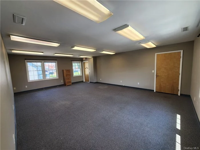 Located within a multi-tenant retail/office building in the Village of Fishkill, the two adjoining spaces could be combined for 960SF with private rear entrance, separate utilities, shared restrooms. Suite 205 is 500SF and Suite 206 is 460SF. Both in good shape, but could look great with some new carpeting and paint. Rear parking lot and free street parking.