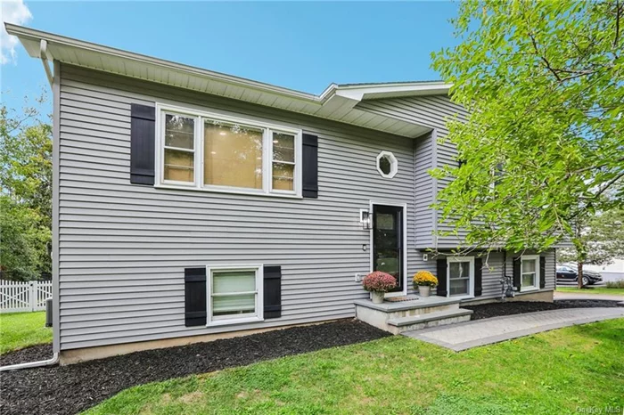 Valley Cottage, New York - Welcome Home! There is absolutely nothing to do but bring your personal belongings - Home features an open floor concept on the main living area with an updated kitchen with stainless steel appliances, granite countertops and a kitchen island leading onto a deck overlooking a fairly large back yard. continuing with the open floor concept, you have your formal dining room and living room areas. Also on the main level you will find an oversized primary bedroom suite with a walk-in-closet and primary bathroom. You also have a bedroom and full bath. Downstairs open floor concept continues - you have a kitchen with a counter eating space, living room leading onto a patio, laundry room, full bath and 2 bedrooms. The home is conveniently located to major highways, and shopping areas, parks and lots more. You will not be disappointed!