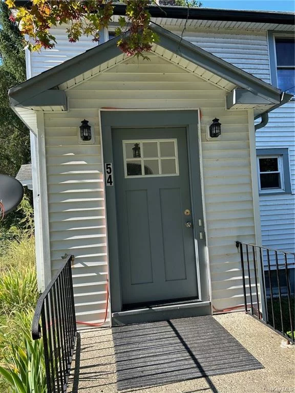 Two bedroom apartment on first floor of a two family house. Freshly painted with new carpet. One car garage located across the street as well as a coin operated washer and dryer. Centrally located to the Village of Highland, Rail Trail, Walkway Over the Hudson and Metro North in Poughkeepsie. Landlord provides trash removal, snow removal, lawn care, heat and hot water. Tenant is responsible for their electric, propane for the stove, and internet/cable. No Pets and No Smoking. Application, credit report, and six months proof of monthly income required. Month to month lease.