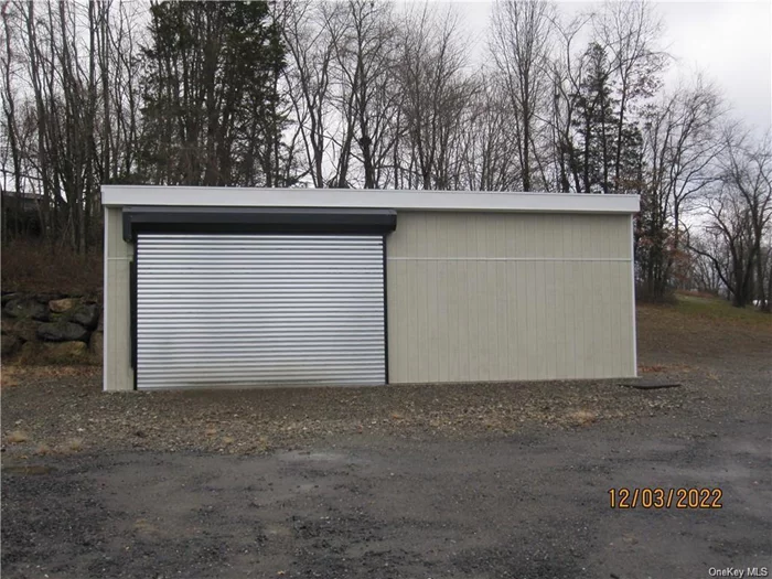 Comfortable dry workspace for those rainy summer days! Approximately 600 SF, 34X18 building with 10 ft lockable overhead door and electricity. Great for a small work space or storage for equipment. Electricity is included in the rent! Outdoor space for parking additional vehicles. Hurry and get inside before winter!