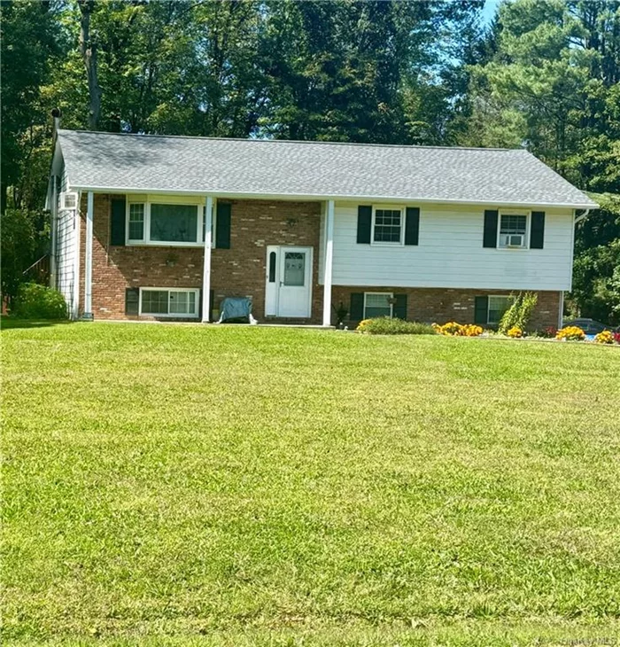 Positioned on a tranquil cul-de-sac, this bi-level home spans just over 2500 square feet. The main level features a spacious living room, dining area, and kitchen, accompanied by a hallway bathroom with dual entrances, providing access from the primary bedroom, and two additional bedrooms.The lower level encompasses a roomy storage area, laundry room, and a generous den/office with a separate entrance. Schedule your showing! This one won&rsquo;t last!!