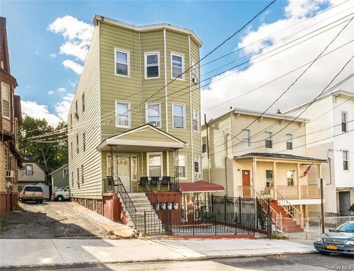 A 4 unit, multi-family home that is just the property you have been waiting for.consists of (3) Three Bedroom/1 Bathroom Units, each approx. 1, 200 square feet and (1) Two Bedroom/1 Bathroom, approximately 700 square feet. Unit 1 renovated in 2017/2018. Unit 2 updated in 2022. Unit 3 gut renovated in 2023. Unit 4 renovated in 2019. New hot water heater installed in 2024. In addition, there is a two car garage, with a loft at the rear of the property. Roof last updated in 2024 (replacement of membrane sections and silicone coating performed on entire roof). This property sits on a 34 x 138 lot with a shared driveway. Virtual Tours of units 1, 3 and 4 available upon request. Annual property taxes (2023) are $13, 100.00. Viewings by appointment only.