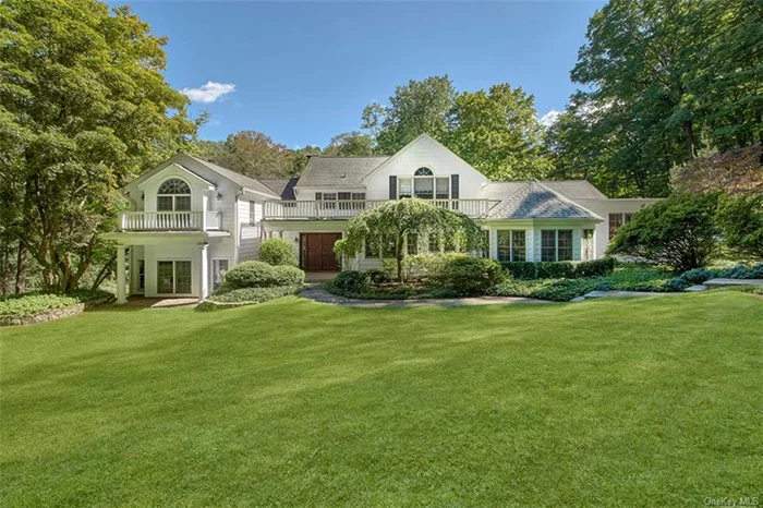 Welcome to a perfect blend of sophistication and comfort! This immaculate 4-bedroom center hall Colonial, located in the prestigious Lawrence Farms East neighborhood, exudes exquisite craftsmanship and thoughtful design. From intricate custom millwork to a gourmet kitchen equipped with premium appliances, every detail of this home is crafted to captivate. As you enter, the welcoming foyer with hardwood floors establishes a warm, inviting atmosphere. Both the spacious living and family rooms feature charming fireplaces and open directly to the outdoors, making it an ideal retreat throughout the year. The chef&rsquo;s kitchen, complete with a breakfast nook, showcases state-of-the-art appliances, while the custom built-ins throughout the home add both style and practicality. The expansive layout includes a bright home office, a sun-drenched screened porch, and a grand dining room perfect for hosting elegant dinners. The very large living room offers a comfortable setting for intimate gatherings. The luxurious primary suite with cathedral ceiling is a private haven with four walk-in closets, a spa-like bath, and a balcony offering serene views. Two additional bedrooms share a generous hall bath, while the third bedroom features a private en-suite bath. Step outside to the expansive wrap around deck off the living room where you&rsquo;ll find a peaceful 1.65-acre property with level lawns and sitting areas bordering the scenic Whippoorwill Trails and conservation land, ideal for relaxation or outdoor entertaining. Discover the perfect harmony of elegance, comfort, and tranquility in this stunning Lawrence Farms home.