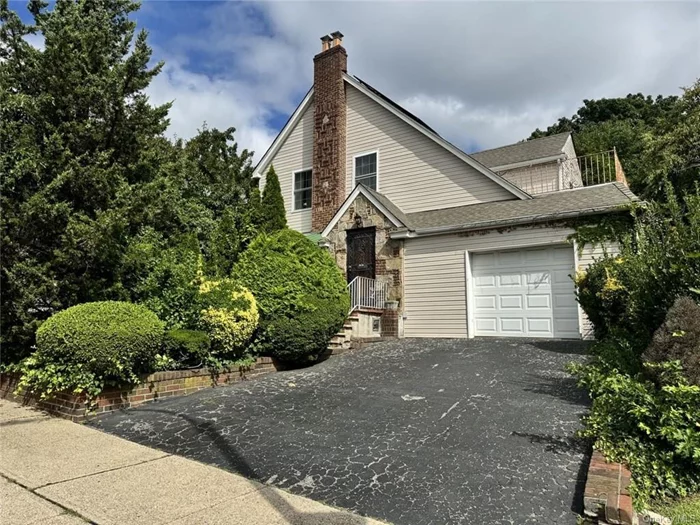 Located in the heart of the sought-after Jamaica Estates neighborhood, this large and inviting home offers 4 bedrooms and 2.5 bathrooms. The top floor features 3 bedrooms one of which has a balcony, while the main level includes a converted room that can serve as a 4th bedroom or office. The home boasts generous living and dining spaces, perfect for entertaining. The kitchen offers ample cooking space, plenty of countertops, and abundant cabinetry.  The finished basement adds versatility, providing an additional bedroom or extra living area, complete with a new washer and dryer. Enjoy the outdoors in the large backyard, perfect for relaxation. The property also includes a driveway for off-street parking (garage not included).  **Utilities are not included /solar panels lessen electric bill significantly** Schedule your appointment now to view this must-see home! AVAILABLE NOW!